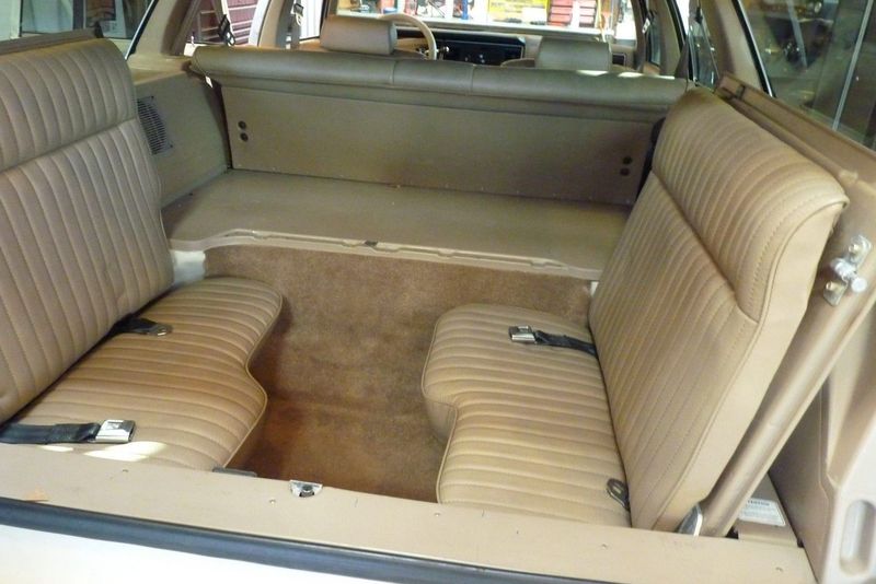 A Station Wagon with a Backward-Facing Seat