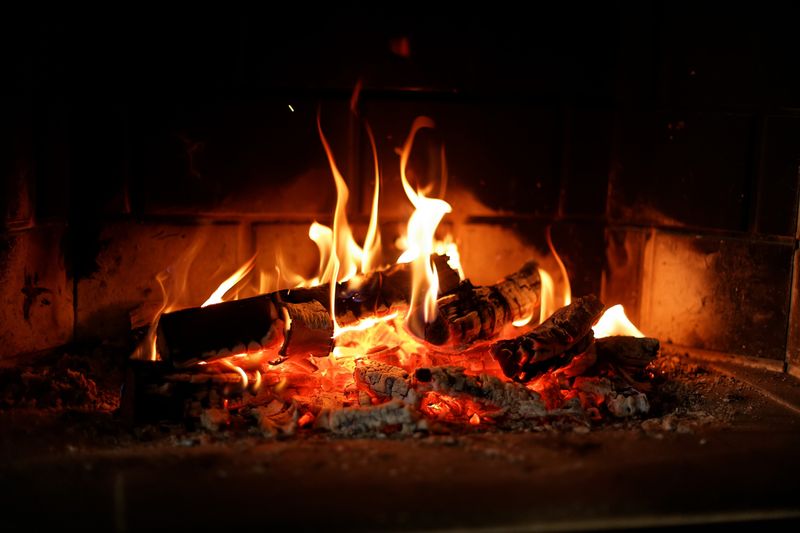 Burning a Real Yule Log in the Fireplace