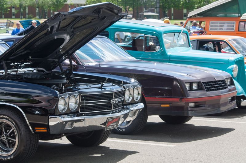 Muscle Cars Lined Up Like a Drag Race Was About to Break Out