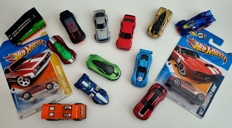 Kids Clutching Die-Cast Models While Eyeing the Real Deal