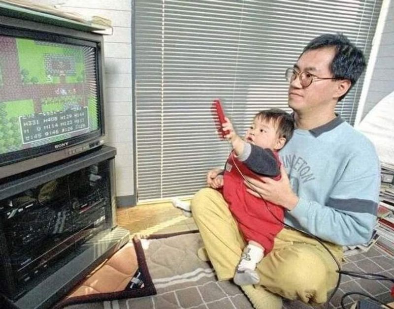 Akira Toriyama and Son Playing Dragon Quest
